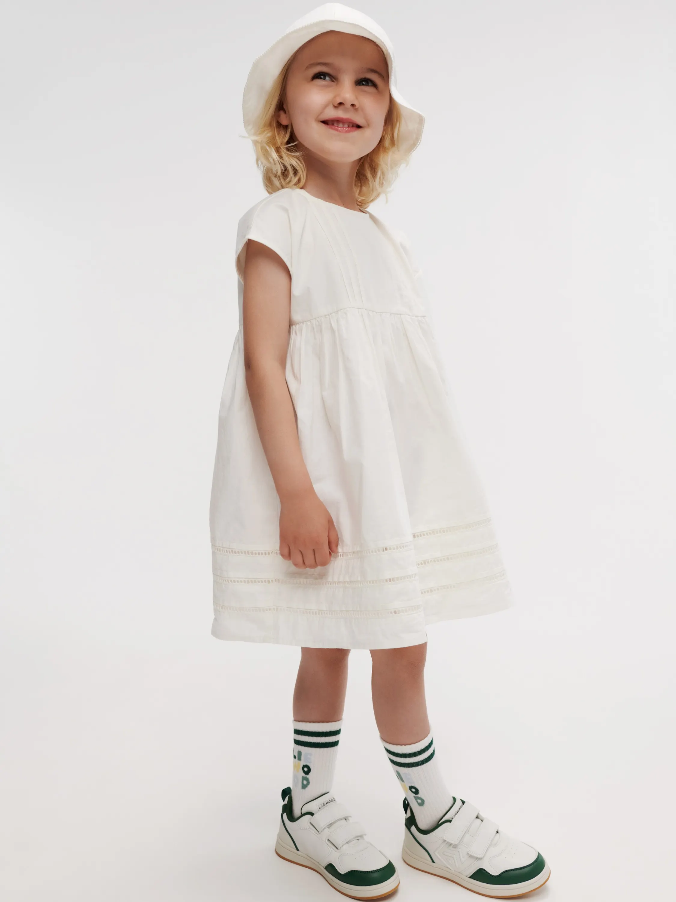 Liewood - sukienka z ażurowymi detalami Gudrun creme de la creme