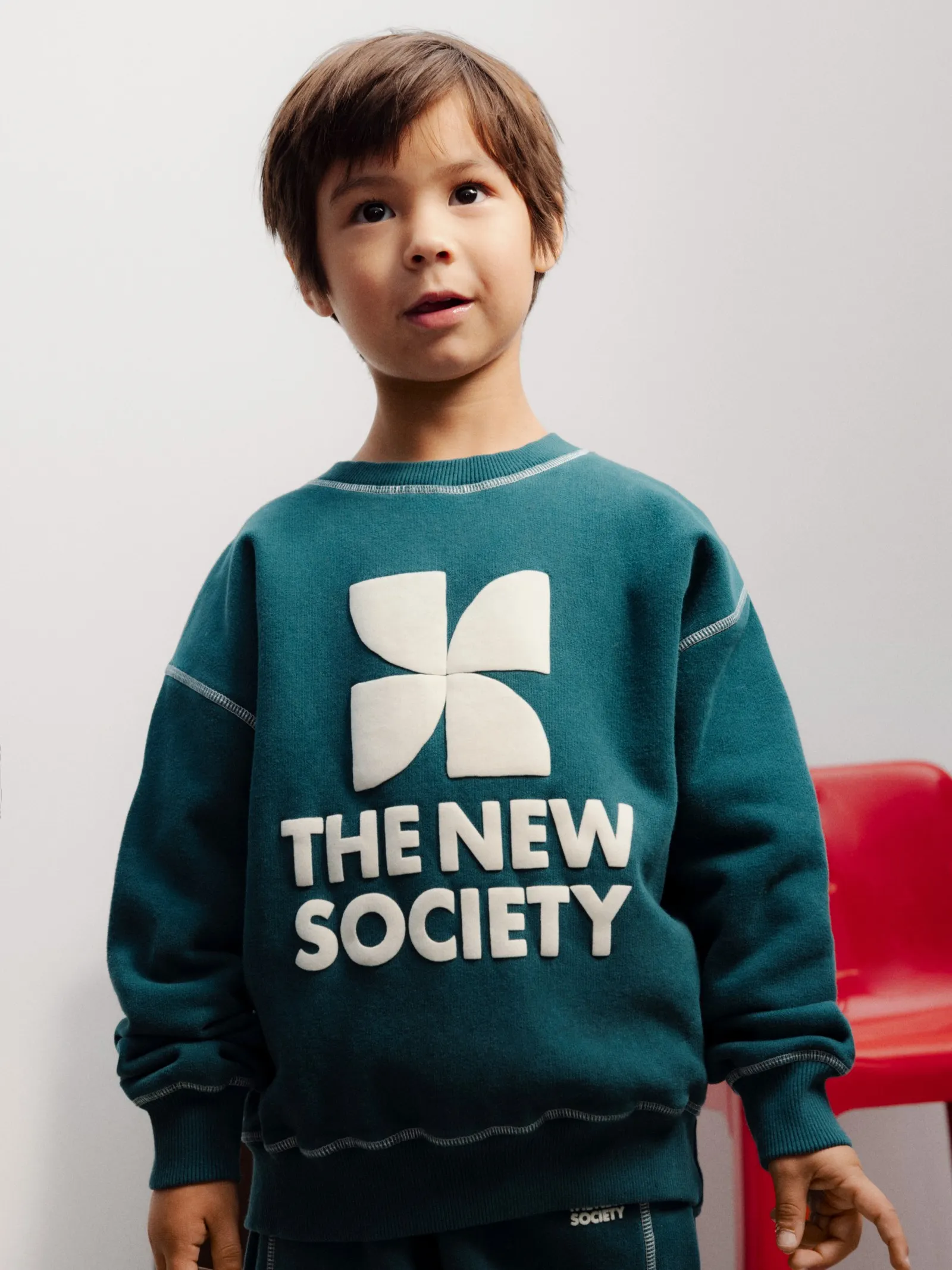 The New Society - bawełniana bluza TNS Logo Dark Sea