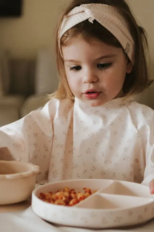 Bamboom - wodoodporny śliniak z rękawami i kieszonką Tulips