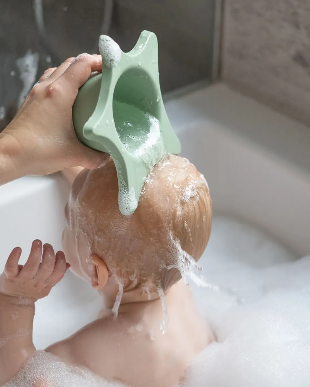 Kindsgut - kubek do mycia głowy dla dzieci Rozgwiazda w kolorze pistacjowym Kindsgut - kubek do mycia głowy dla dzieci Rozgwiazda w kolorze pistacjowym