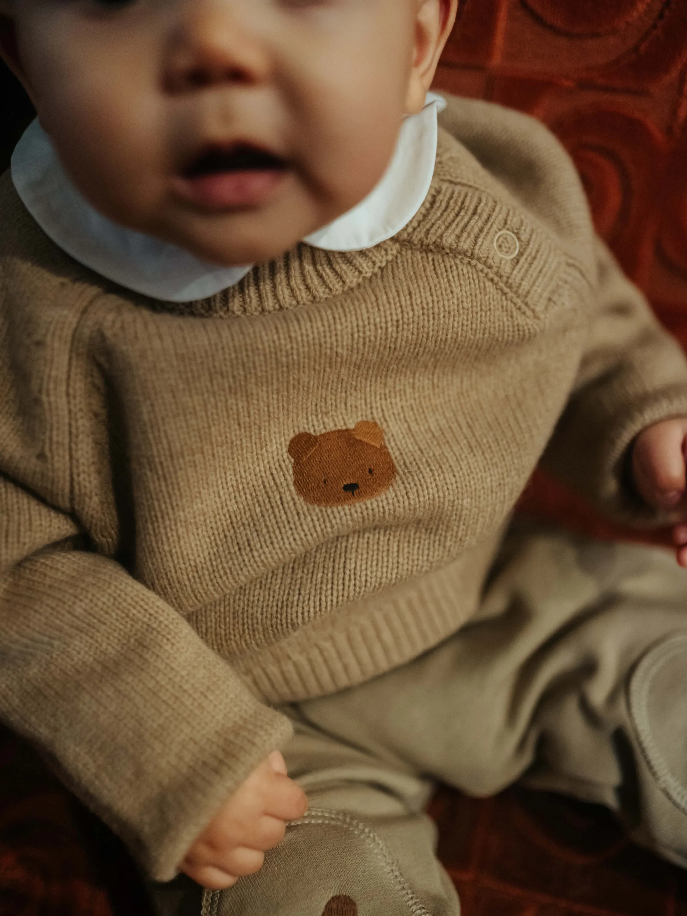 Donsje - sweter niemowlęcy z wełny merino Sibbe Bear