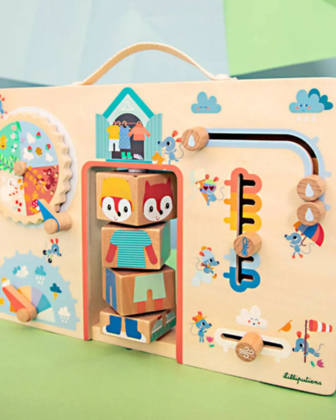 Lilliputiens - drewniana tablica manipulacyjna walizka "Ubranie na każdą pogodę" Lisiczka Alice 2 lata +