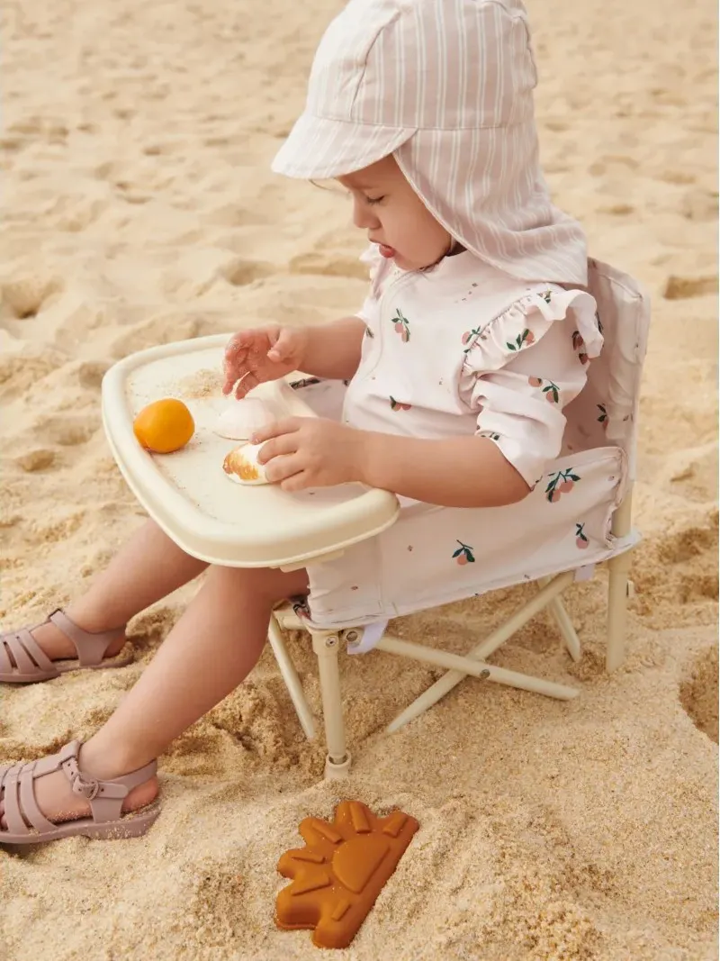 Liewood - kombinezon kąpielowy na krótki rękaw UV Amel Printed sea shell peach 