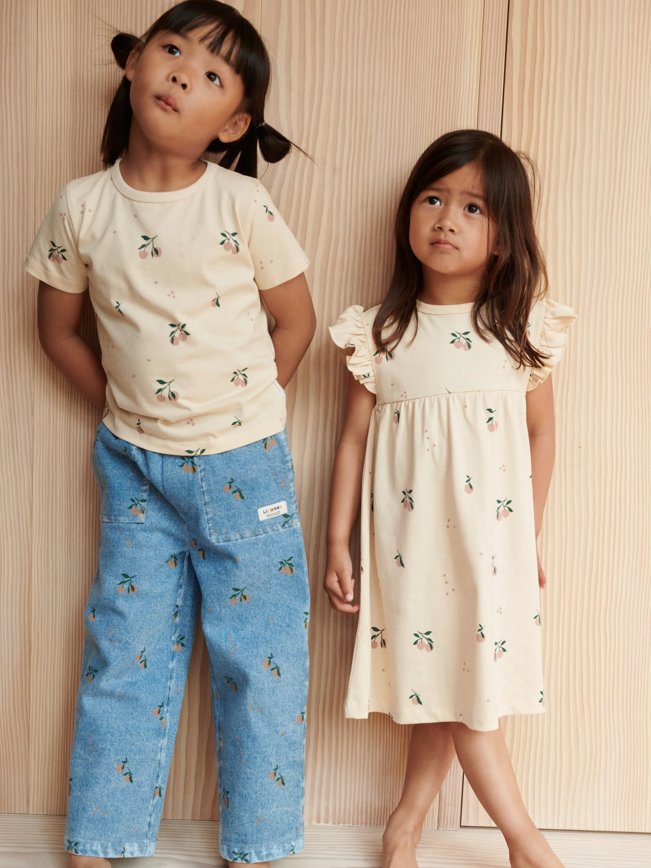 Liewood - spodnie jeansowe z nadrukiem Cesar light blue denim peach