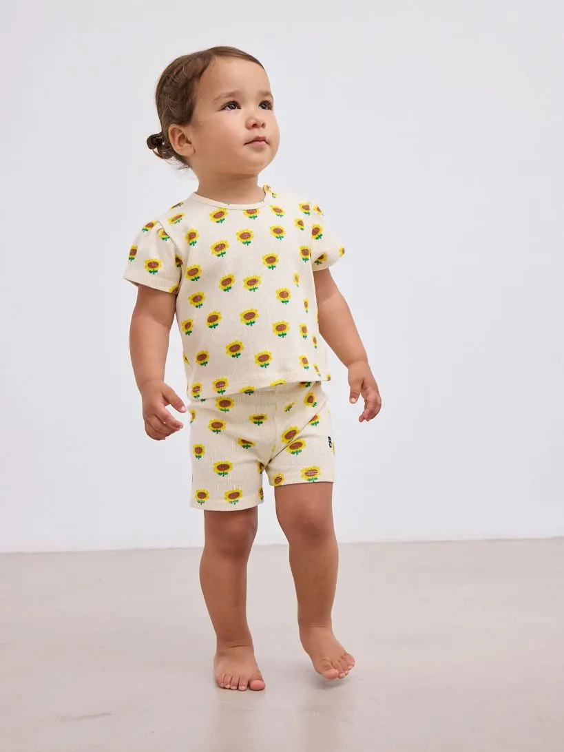 BOBO CHOSES - dziecięce krótkie legginsy Sunflower w słoneczniki beige beżowe BOBO CHOSES - dziecięce krótkie legginsy Sunflower w słoneczniki beige beżowe