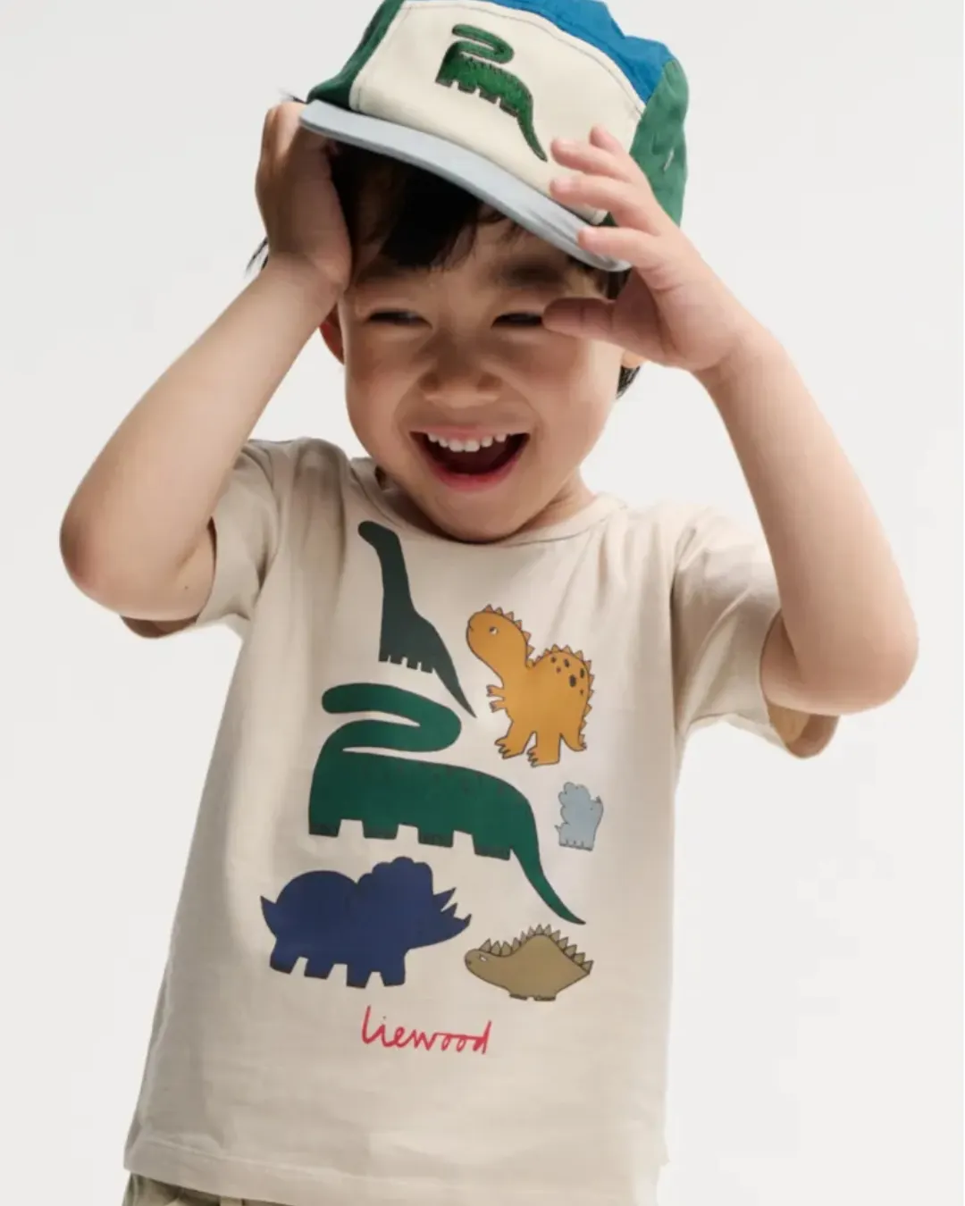 Liewood - koszulka T-shirt z krótkim rękawem i nadrukiem Apia Placement Dinosaurs Sandy Liewood - koszulka T-shirt z krótkim rękawem i nadrukiem Apia Placement Dinosaurs Sandy