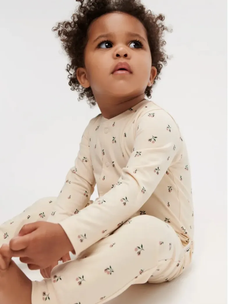 Liewood - pajacyk śpioszki niemowlęce Birk Printed sea shell peach mini