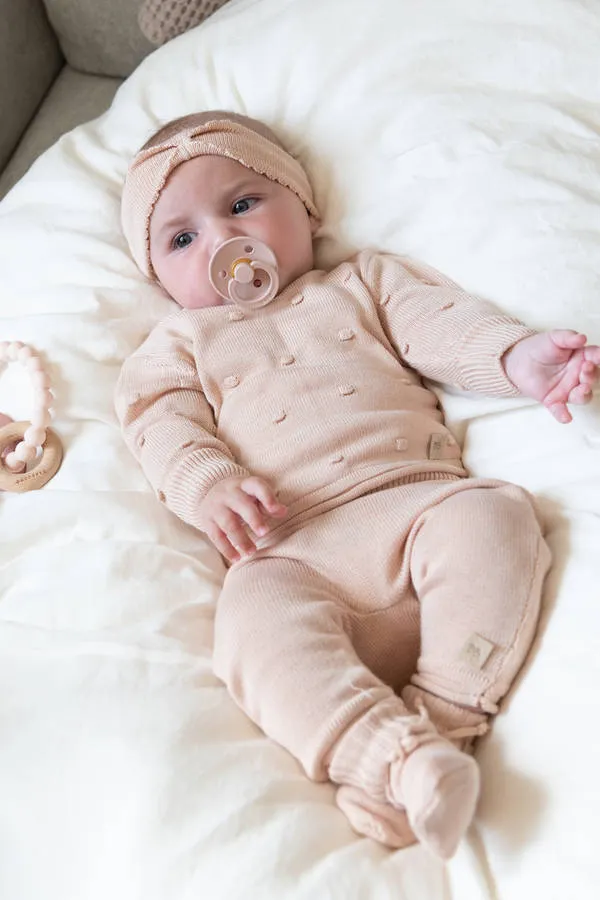 Bamboom - bambusowy sweter dla niemowlaka z pomponami różowy Bamboom - bambusowy sweter dla niemowlaka z pomponami różowy