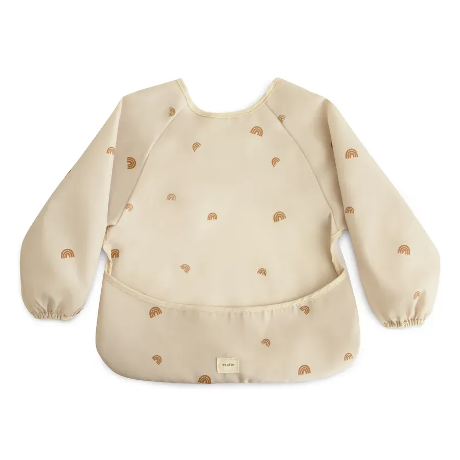 Mushie - śliniak wodoodporny z długim rękawem i kieszonką Rainbow